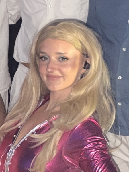 One of the band's two lead vocalists, photographed after a show